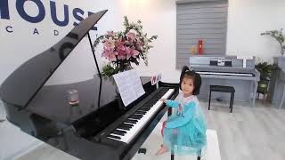 The kid learns how to play piano in Viet Nam