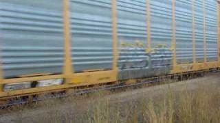 CSX Triple autorack and empty welded rail train