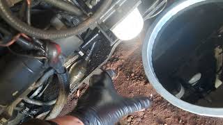 Bobcat S130 skidloader fuel filter change.