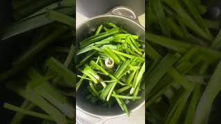 Homemade chives and garlic sauce with salt and oil