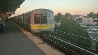 LIRR train Budd M3s meet M7s at Bellmore NY station.