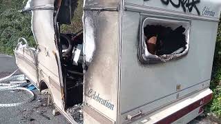 Burnt out and abandoned caravan