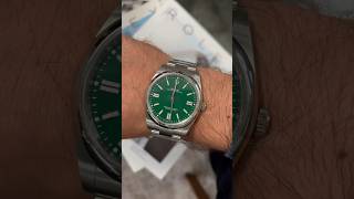 Rolex oyster perpetual 124300 41 mm green dial