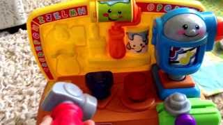 Comparing the Fisher-Price tool bag and tool bench baby toys