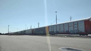 CSX M471 heading through Wilsmere Yard Delaware with Family Lines cars.