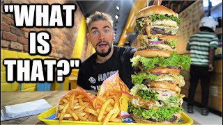 UNDEFEATED "MONSTER BURGER CHALLENGE" IN LONDON UK (Uncut With Eating Sounds) | Joel Hansen Raw