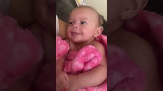 Baby girl smiling and sticking Tongue out￼