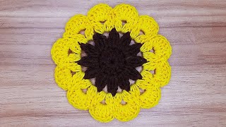 Discover how to create a stunning sunflower coaster with this step-by-step guide | watch now