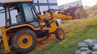 JCB Excavator in Action: Clearing Land for a Fresh Start!