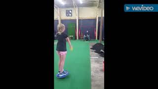 Ady nine year old doing softball pitching drill