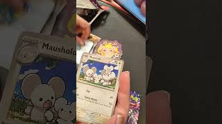 Opening a pack of Pokemon TCG Paldean Fates at the Nintendo store! WE GOT THIS!