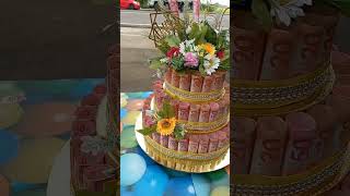 Money Cake #money  #moneycake #moneycakesurprise #artificialflowers #50thbirthday #goldenbirthday