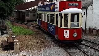 Passing Tram as it exits Colyton station