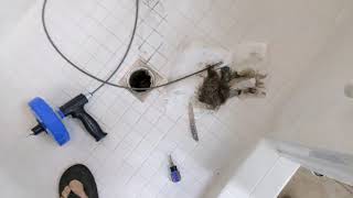 Home repair clogged bathroom shower drain two by froggy