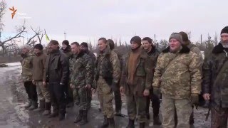 Обличчя війни: волонтери привезли кутю та нагороди бійцям в Піски