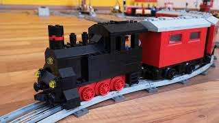 Home-made steam locomotive, home-made wagon, motor wagon, with 2x 7725 passenger cars.