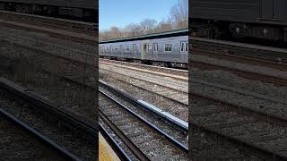 R68A N train arrives at Fort Hamilton Parkway