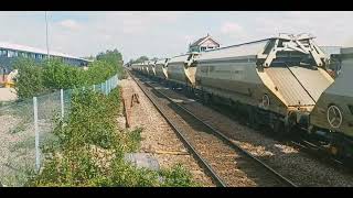 69004 & 69008 heading through Whittlesea towards Peterborough.