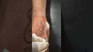 om tattoo small.