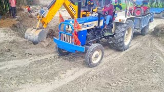 JCB 3dx Backhoe loading soil in tractors trolley  जेसीबी  ट्रैक्टर ट्रॉली में मिट्टी लोड कर रहा है