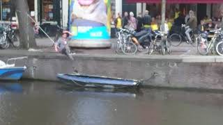 Rope Acrobat over the canal in Amsterdam