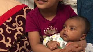 baby is in sisters lap   HD 720p