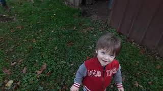 Grandkids in the chicken pen