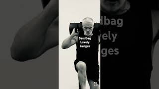 Sand bag alternating forward lunges. Lower body push. #gaa #motivation