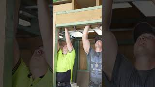 Apprentices learn ceiling framework