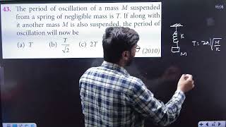 The period of oscillation of mass M suspended from a spring of negligible mass is T . If along......