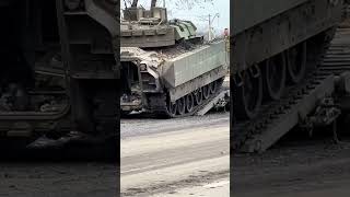 Ukrainian M2A2ODS Bradley getting towed away for repair after taking a hit.