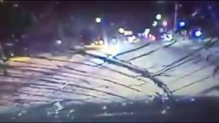 Drunk man belly flops onto police car windshield