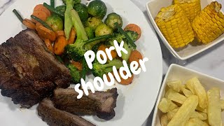 Pork shoulder served with vegetables