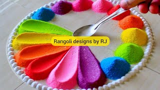 Multi-colored holi Rangoli/rangoli using fork for holi/holi rangoli design/easy rangoli for holi