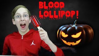 BLOOD LOLLIPOP HALLOWEEN CANDY TASTE TEST REVIEW | CollinTV