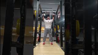 Overhead barbell press.