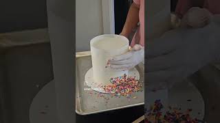 Decorating Rainbow Sprinkle Cake