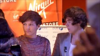 Harry deeply staring at Louis