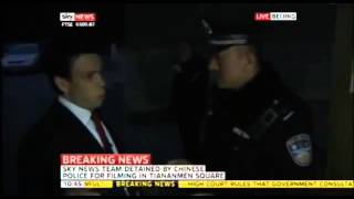 Lcalls - UK reporter broadcasts LIVE from China while detained by state cops.(HD)