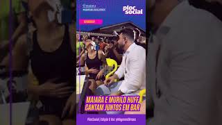 Murilo Huff e Maiara cantando em uma cadeira de bar em Goiatuba, no interior de Goiás