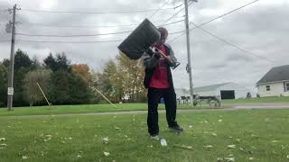 Beating A Water Bottle With A Shovel