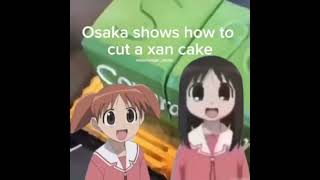 Osaka shows how to cut a xan cake