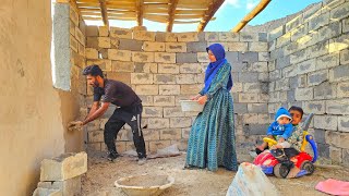 Nomadic Life: Akram and the Children’s in Difficult Days – The Owner Helps Plaster the Hut