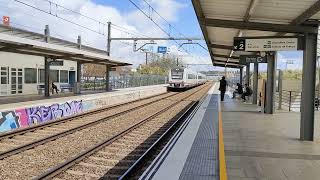 Renfe S-448 pasando por la estación de Viladecans