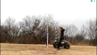 Breaking through a door with a four wheeler!!!(part one)