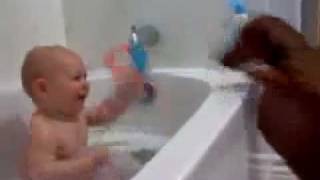 Bath time fun. Super cute!.