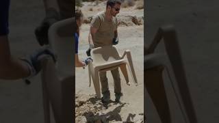 TENET 2 - Archeologists discover a generic plastic chair in the desert