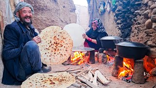 Old lovers cooking with stones in a village cave | village life Afghanistan