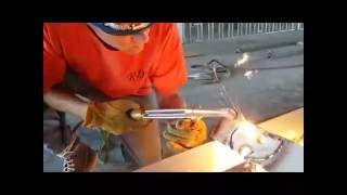 Cutting WU-TANG logo using a torche on steel