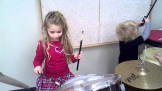 Kayleigh and Ryan drumming